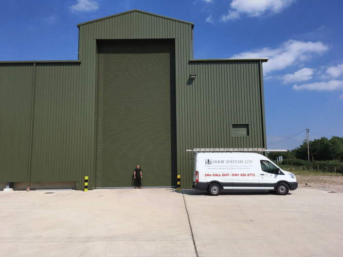 large industrial green door